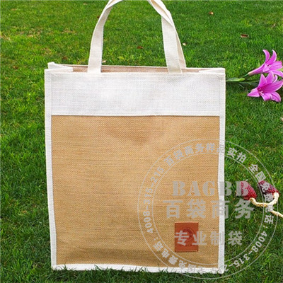 黄麻与白麻双色拼接，麻布本料提手，带LOGO皮标